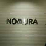 China bans Nomura senior investment banker from leaving mainland -sources